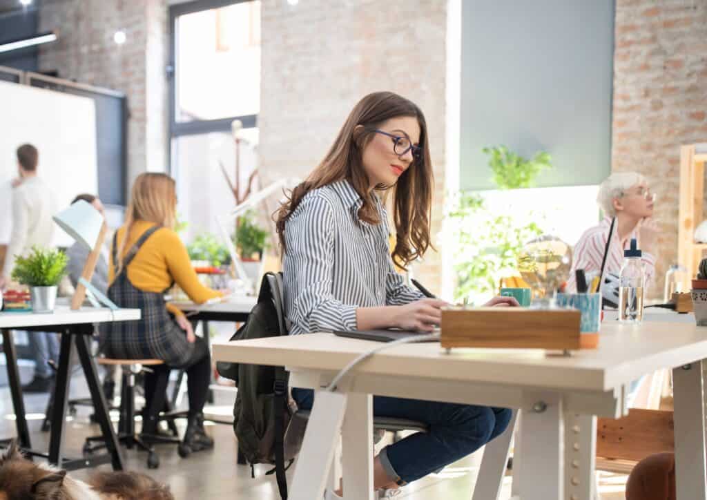 Lady at a high table working